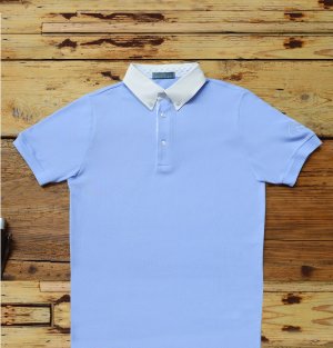 Sky-blue short-sleeved polo shirt, honeycomb texture, white internal details with sky-blue scooter.